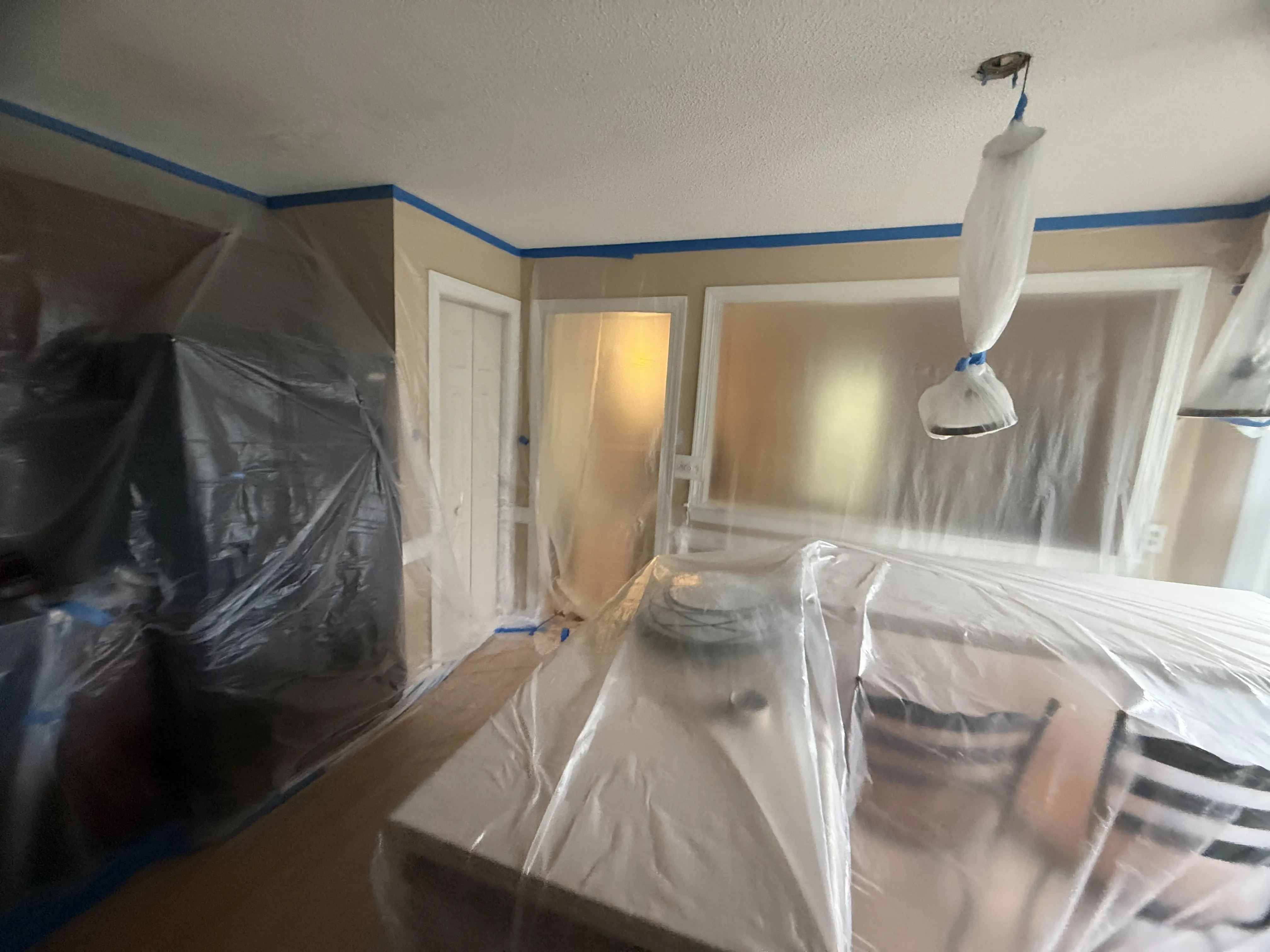 Prepping Raleigh room for popcorn ceiling removal