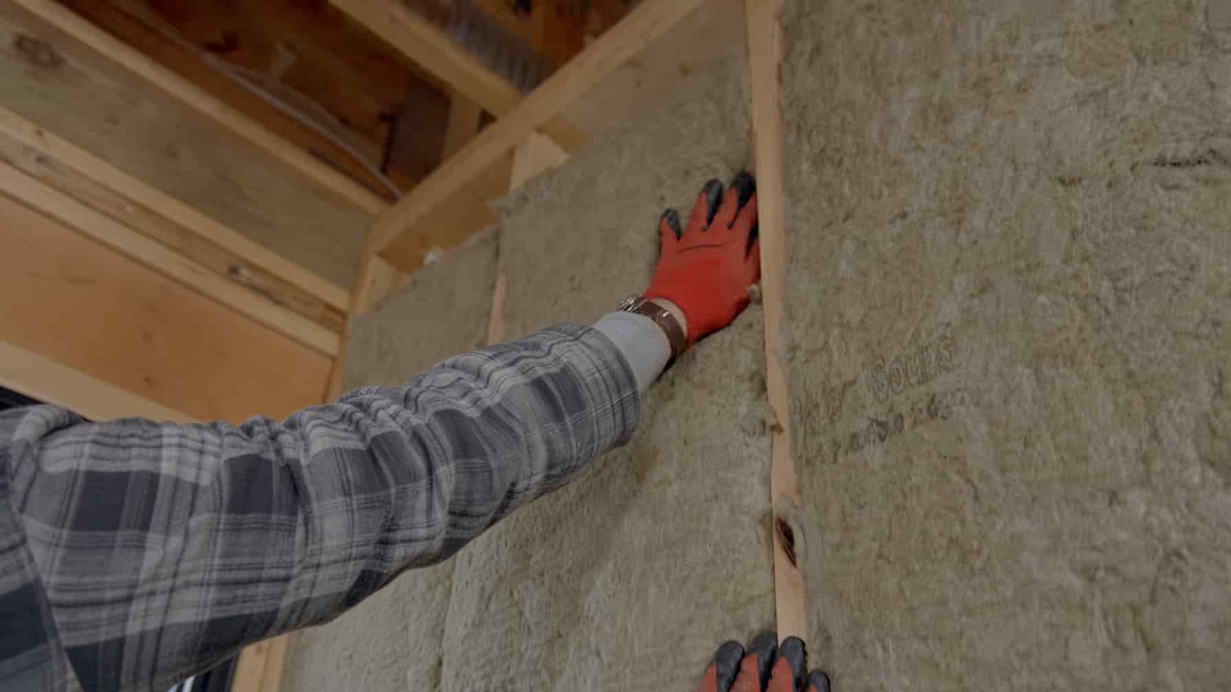 Sound-rated drywall assembly being installed on a shared wall in Raleigh